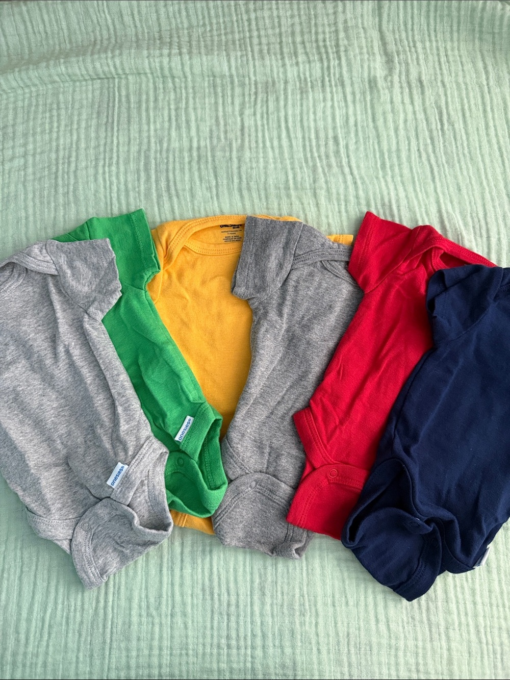 Assorted Baby Onesie Pack in Light Gray, Heather Gray, Green, Yellow, Red, Navy